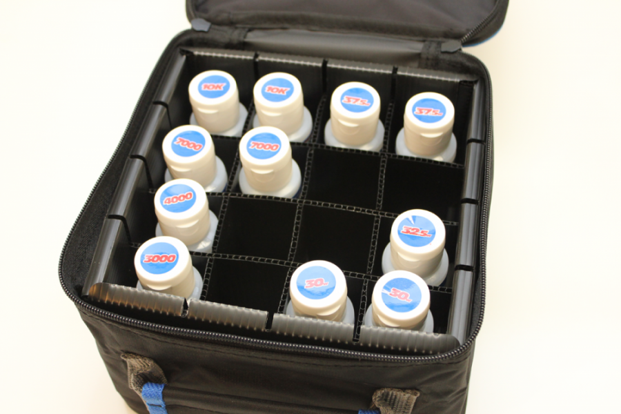 Carry your shock oil in style - Team Associated Fluid Carrier - RC Driver